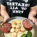Smoked scallops with steak and jalapeños on plate ready to be served