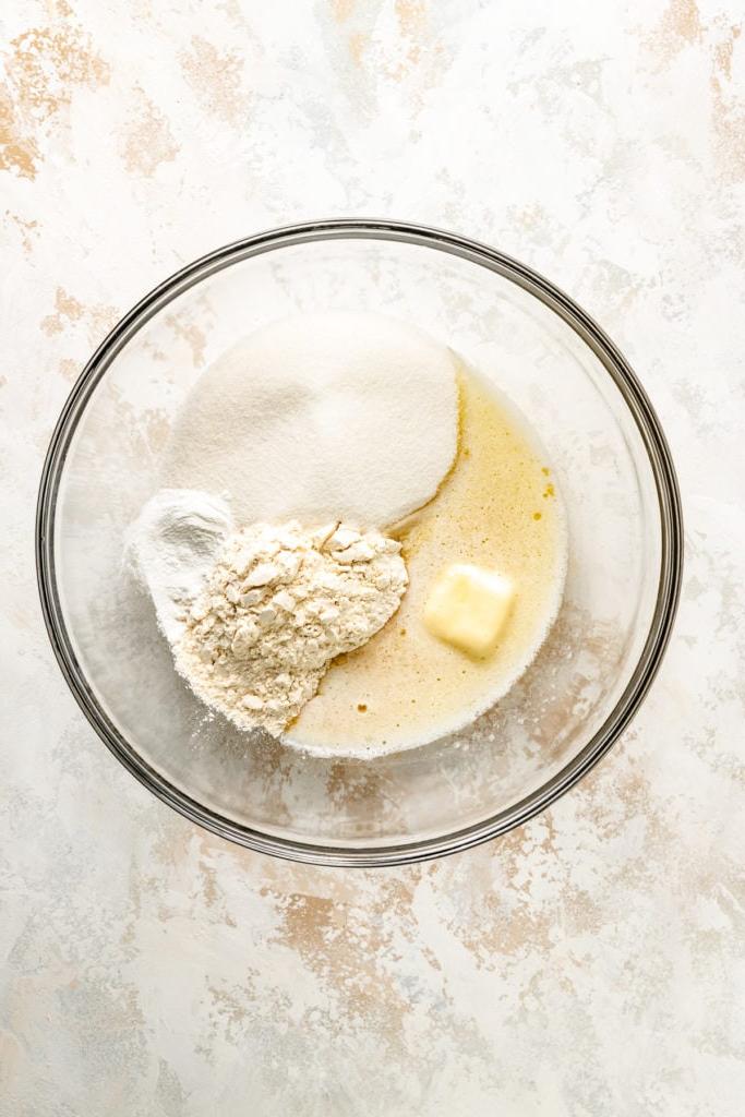 Butter, sugar, and flour in a bowl.