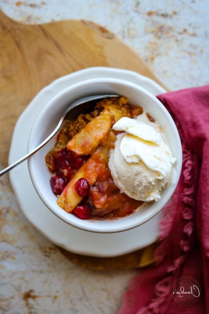 crumble in bowl with vanilla ice cream and napkin