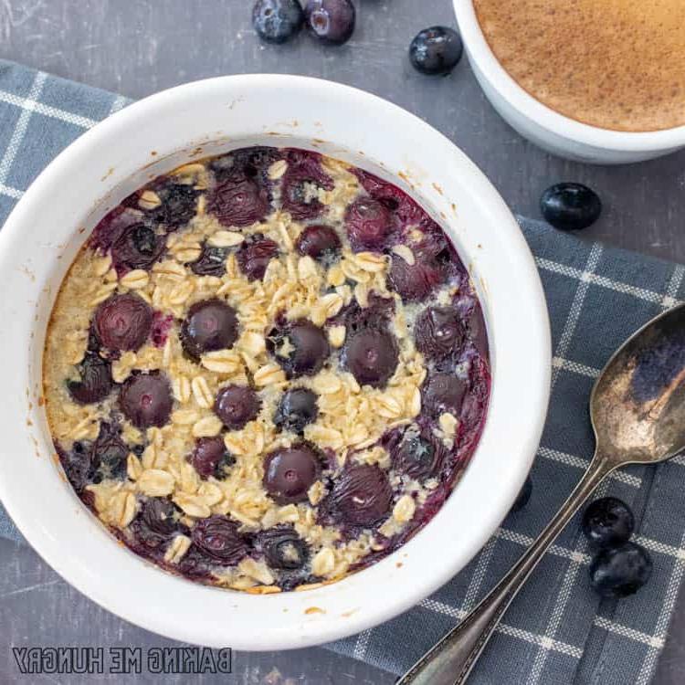 baked oats for one in a bowl with blueberries