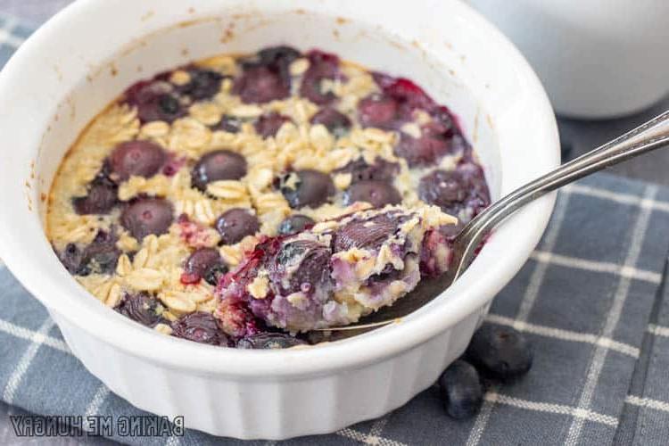 spoon resting in bowl of baked oatmeal