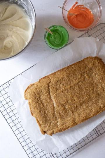 blondies with cream cheese frosting on side
