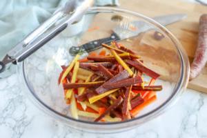 colorful carrots in a glass bowl to make carrot fries